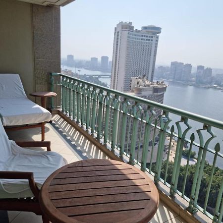 Chez Haytham At Four Seasons Nile Plaza Residential Suite Каир Экстерьер фото