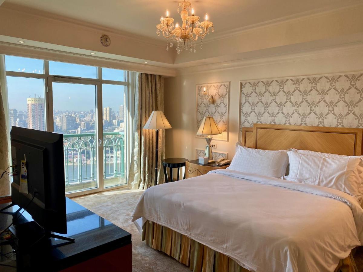 Chez Haytham At Four Seasons Nile Plaza Residential Suite Каир Экстерьер фото