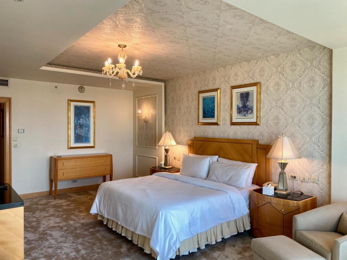 Chez Haytham At Four Seasons Nile Plaza Residential Suite Каир Экстерьер фото