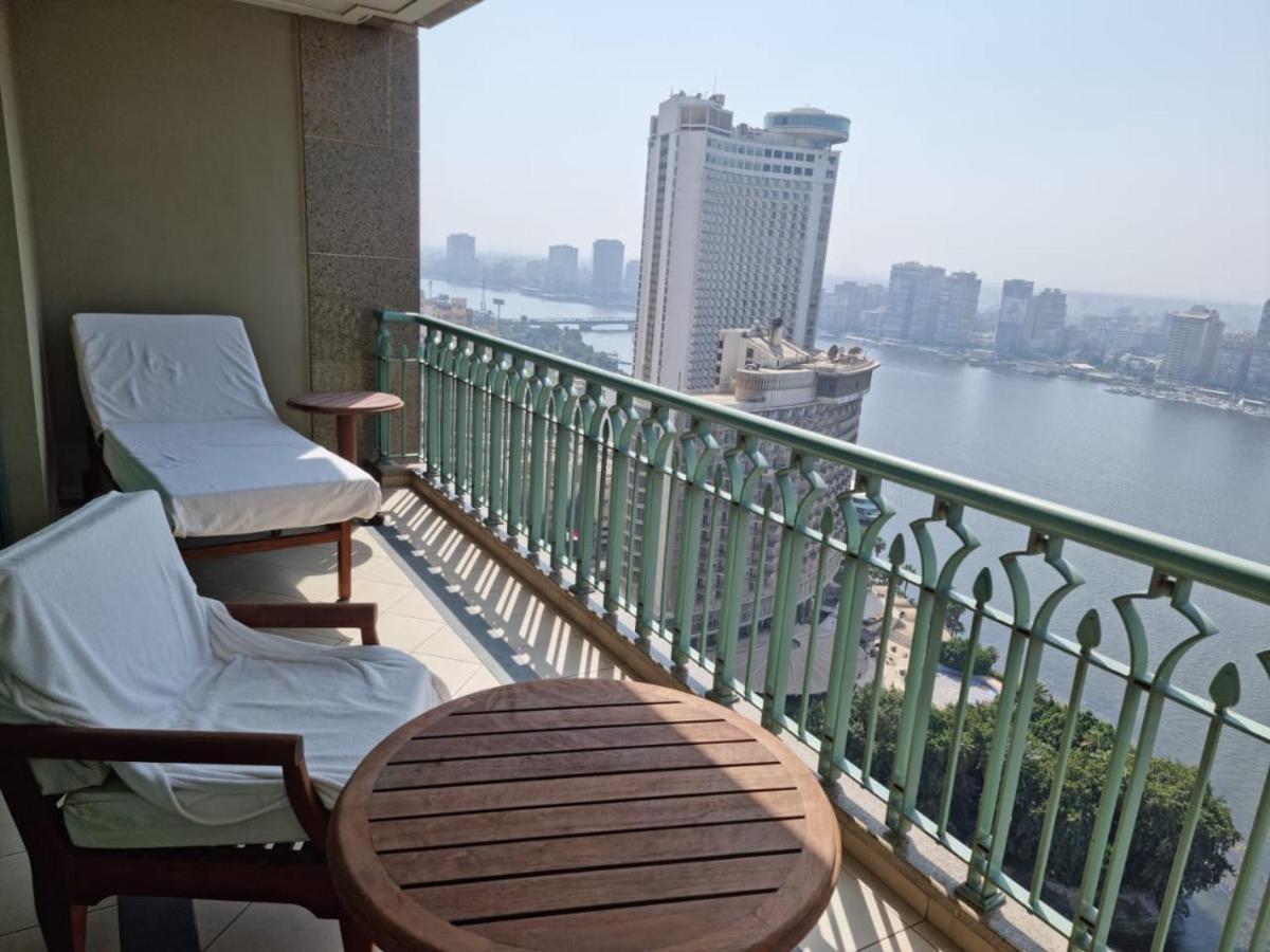 Chez Haytham At Four Seasons Nile Plaza Residential Suite Каир Экстерьер фото
